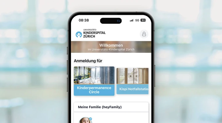 Mobile mit Screen von Kinderspital Zürich App