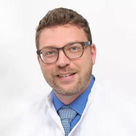 Ein Portrait von dem Arzt Daniel Andreas Müller